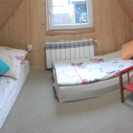 Domek Bialojany Сasa de vacaciones *